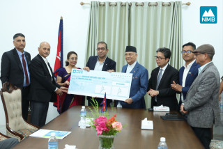 एनएमबि बैंकले जम्मा गर्यो  प्रधानमन्त्री दैवी प्रकोप उद्धार कोषमा रु. ५१ लाख